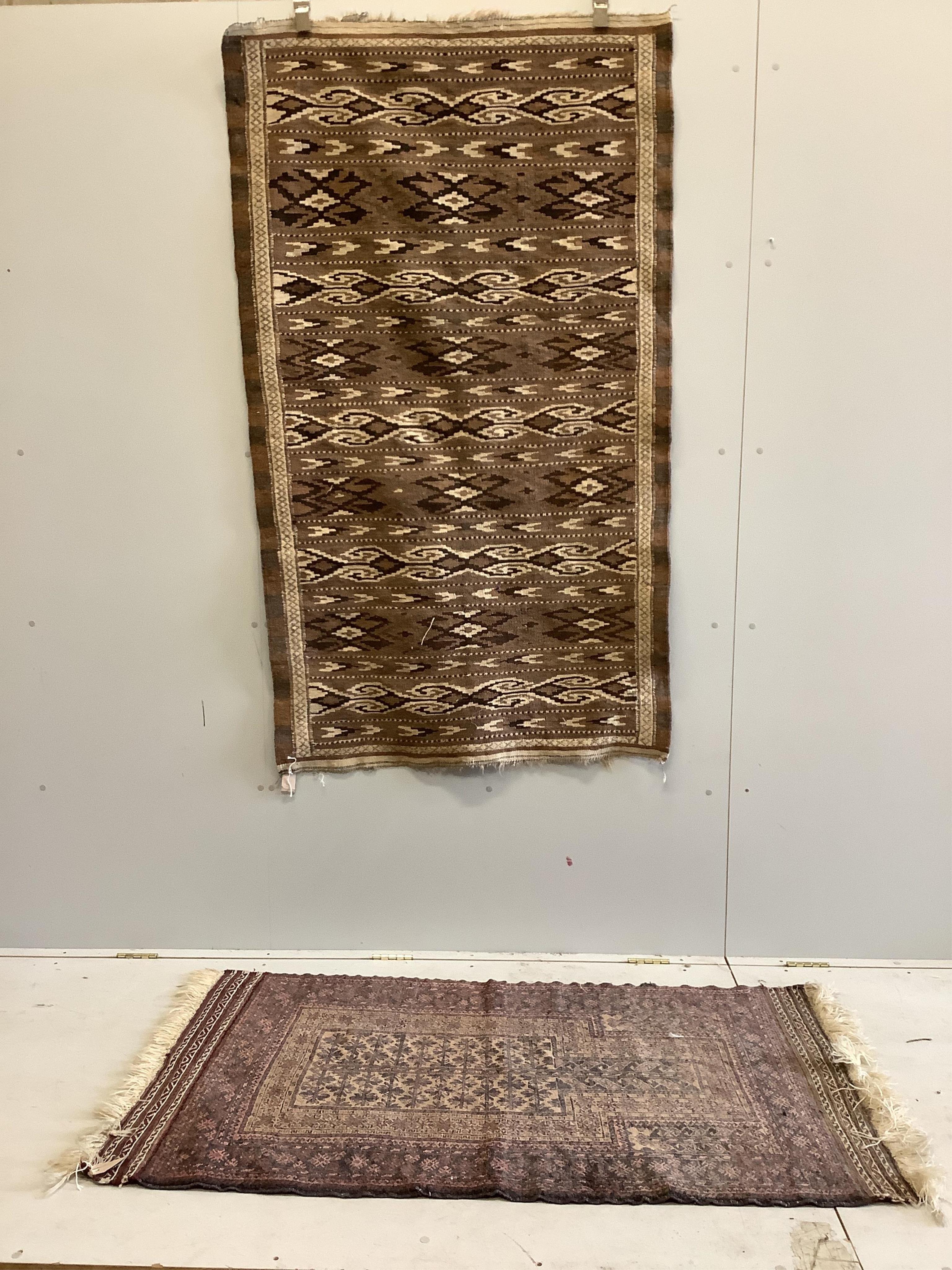 A Kilim flat weave rug together with a Belouch prayer rug, larger 180 x 147cm. Condition - fair